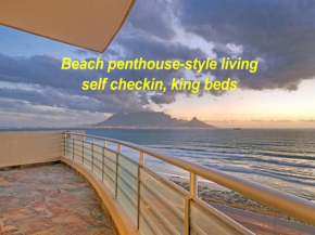 Beach penthouse-style living,self checkin,king beds